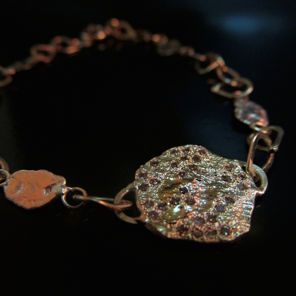Gold diamonds bracelet.